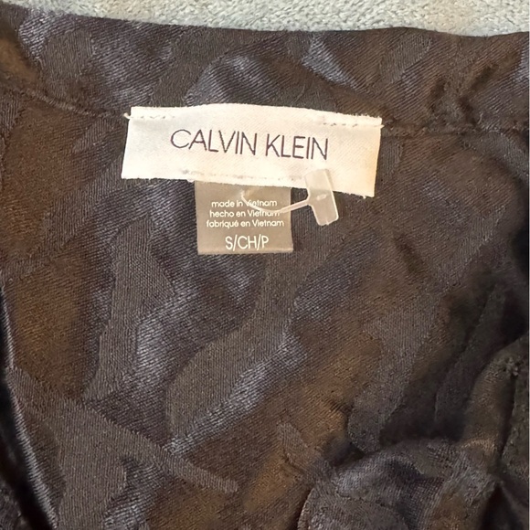 Calvin Klein Textured Black Top
#1021 - Picture 4 of 6